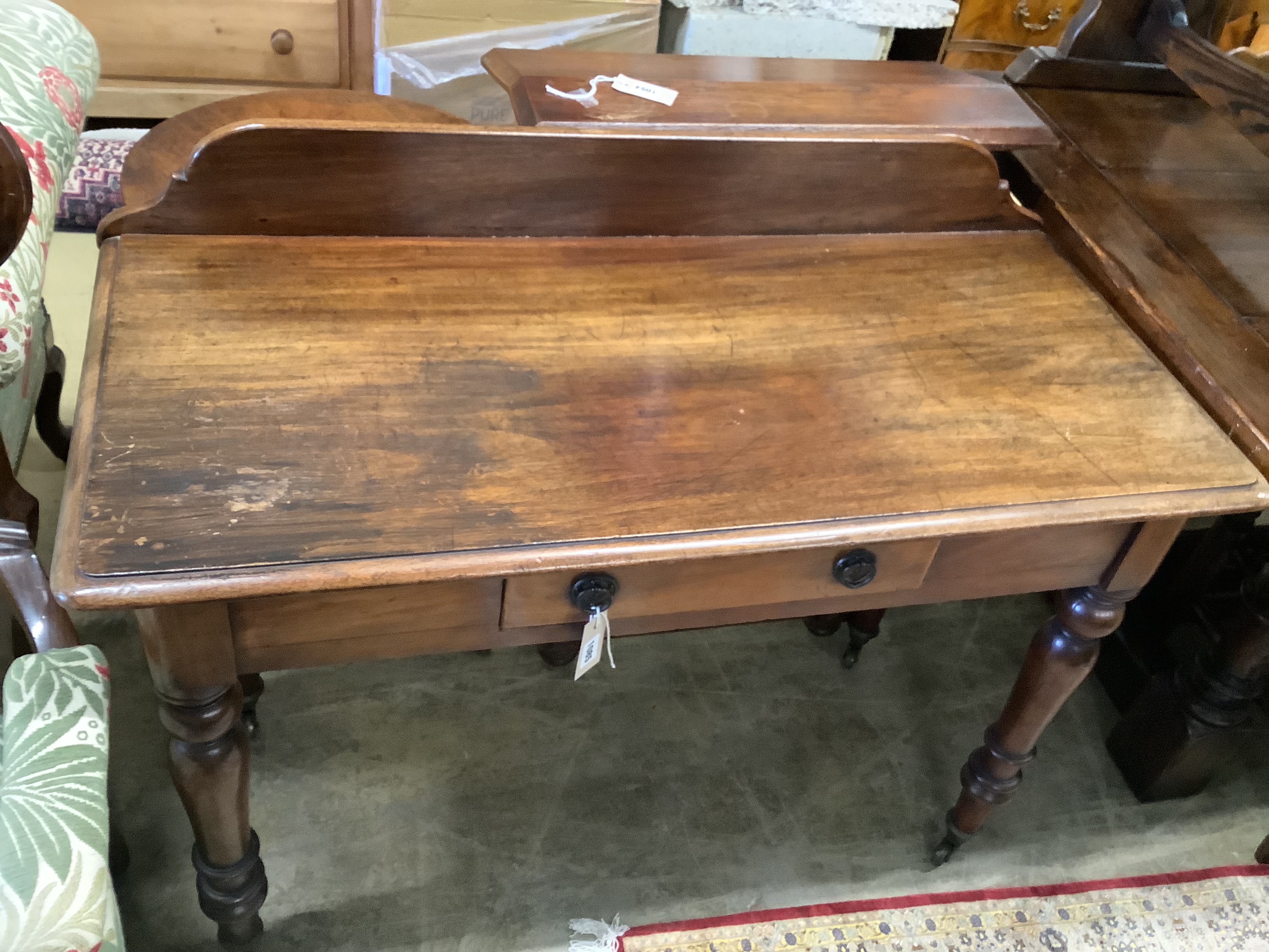 A Victorian mahogany writing table